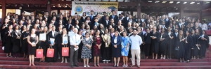 The graduates in a souvenir photograph with guests 