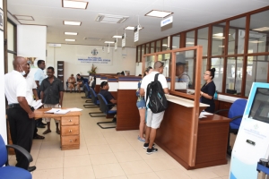 Customers accessing the various services of the department of immigration &amp; civil status yesterday