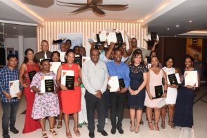 The winners in a souvenir photograph with Minister Dogley and PS Lafortune 22 employees rewarded from 22 tourism establishments