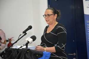 Ms Dookley addressing guests and participants during the ceremony 